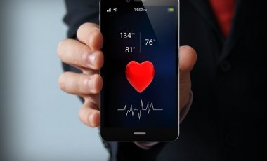 health concept: health app on touchscreen smartphone